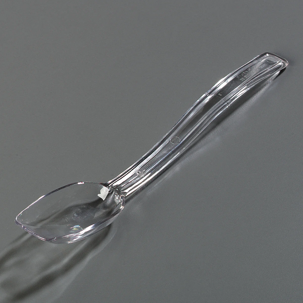 Carlisle 446007 One-Piece Plastic Solid Salad/Buffet Serving Spoon with Notched handle 9" - 1/2 oz. - Clear - Image 6