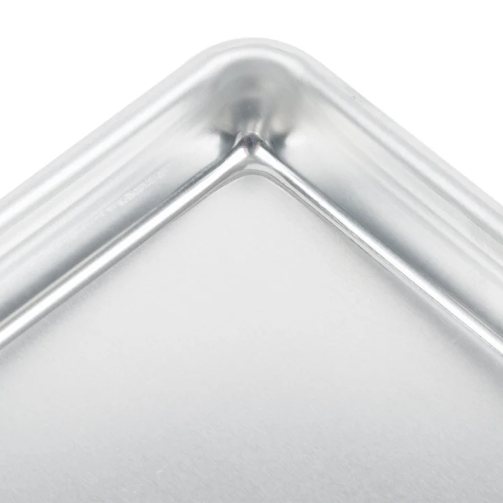 Vollrath 5228 Wear-Ever Eighth Size 16 Gauge 6 1/2" x 9 1/2" Curled Rim, No Wire Aluminum Bun / Sheet Pan - Image 3