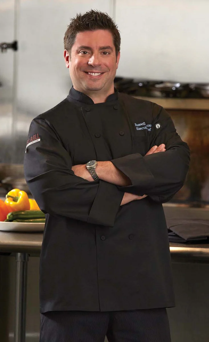 Chef Works JLLSBLKS Unisex Calgary Cool Vent Long Sleeve Double-Breasted Chef Coat with Cloth Covered Buttons - Black / Small