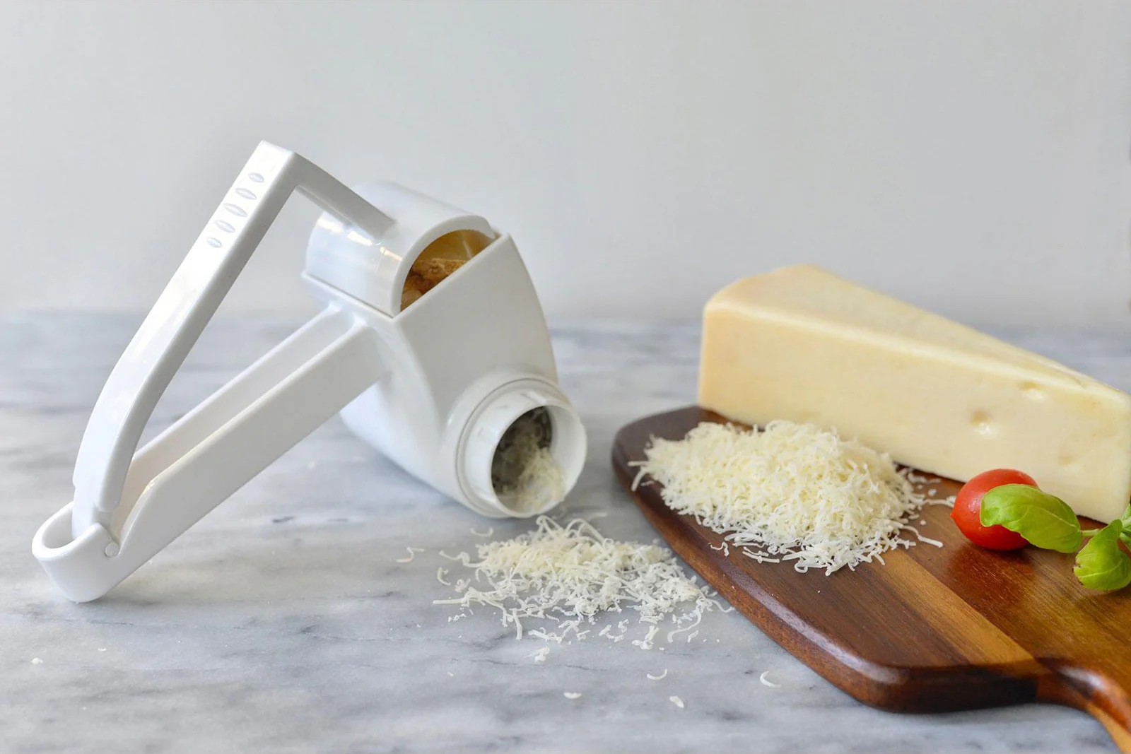 TableCraft 174 Plastic Manual Rotary Cheese Grater with Stainless Steel Drum 7" - White - Image 11