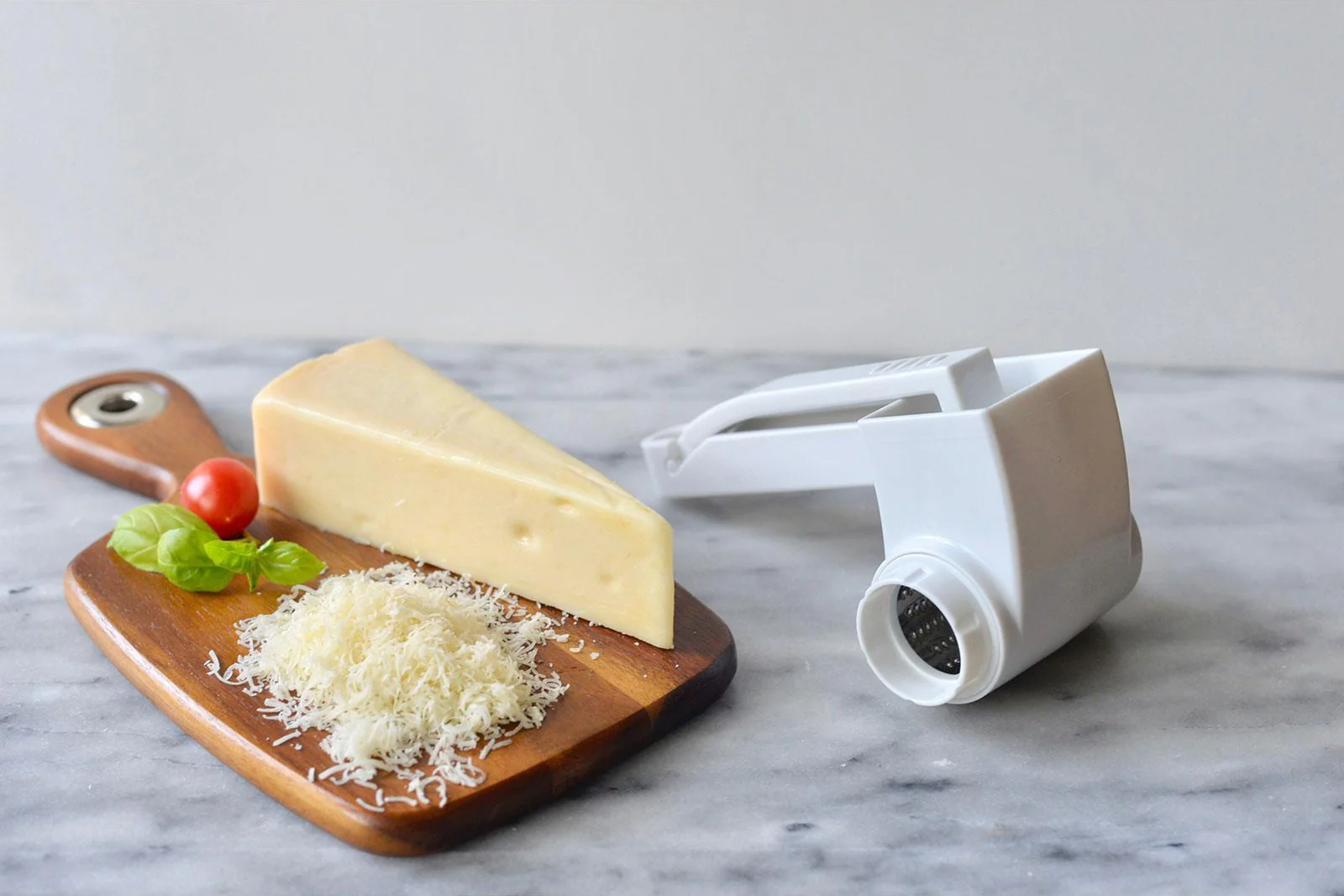 TableCraft 174 Plastic Manual Rotary Cheese Grater with Stainless Steel Drum 7" - White - Image 12