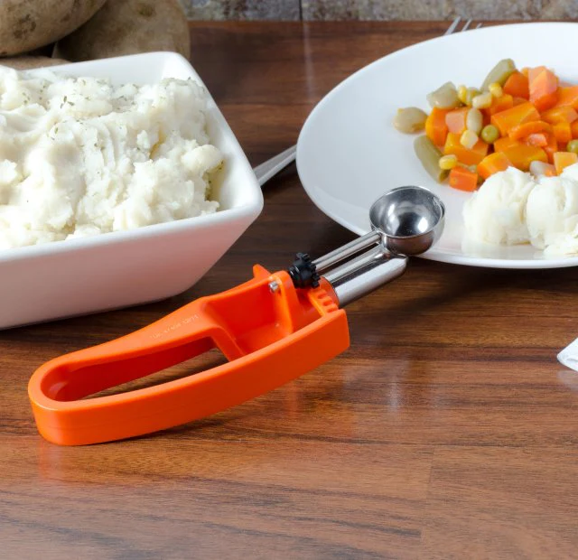 Vollrath 47404 Jacob's Pride Standard Length Disher with Orange Squeeze Handle 0.33 oz. - Size 100 - Image 6