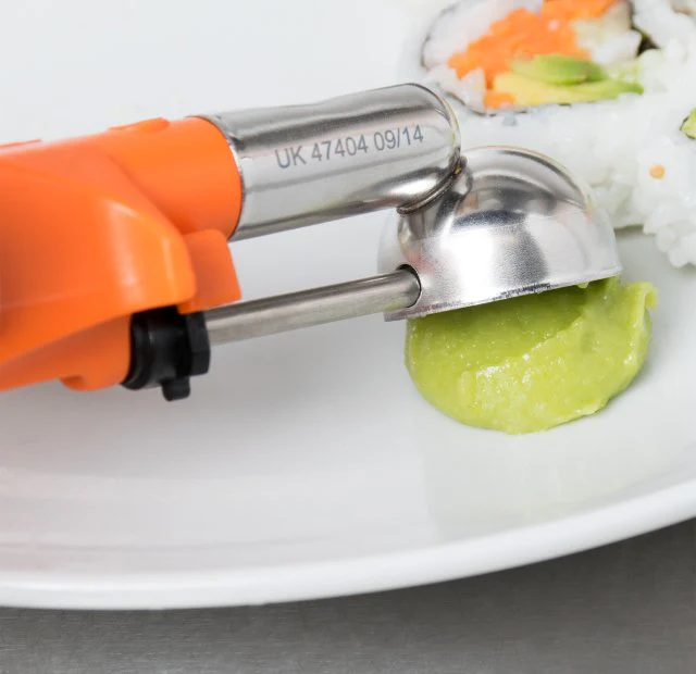 Vollrath 47404 Jacob's Pride Standard Length Disher with Orange Squeeze Handle 0.33 oz. - Size 100 - Image 7